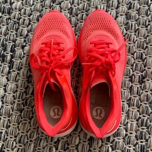 Women’s lululemon running sneakers in bright orange